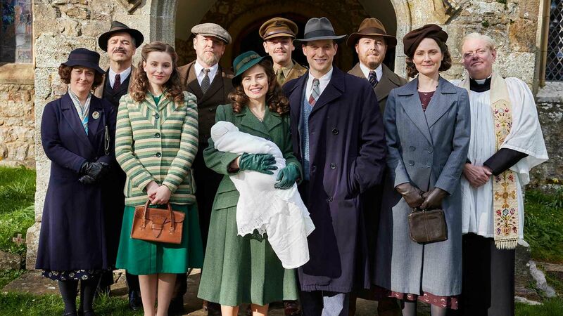 Shown L-R: Hannah Herriot (Gabriel Quigley), James Herriot Sr (Drew Cain), Jenny Alderson (Imogen Clawson), Richard Alderson (Tony Pitts), Helen Herriot (Rachel Shenton), Tristan Farnon (Callum Woodhouse), James Herriot (Nicholas Ralph), Siegfried Farnon (Samuel West), Mrs. Hall (Anna Madeley), Vicar (Mark Chatterton)